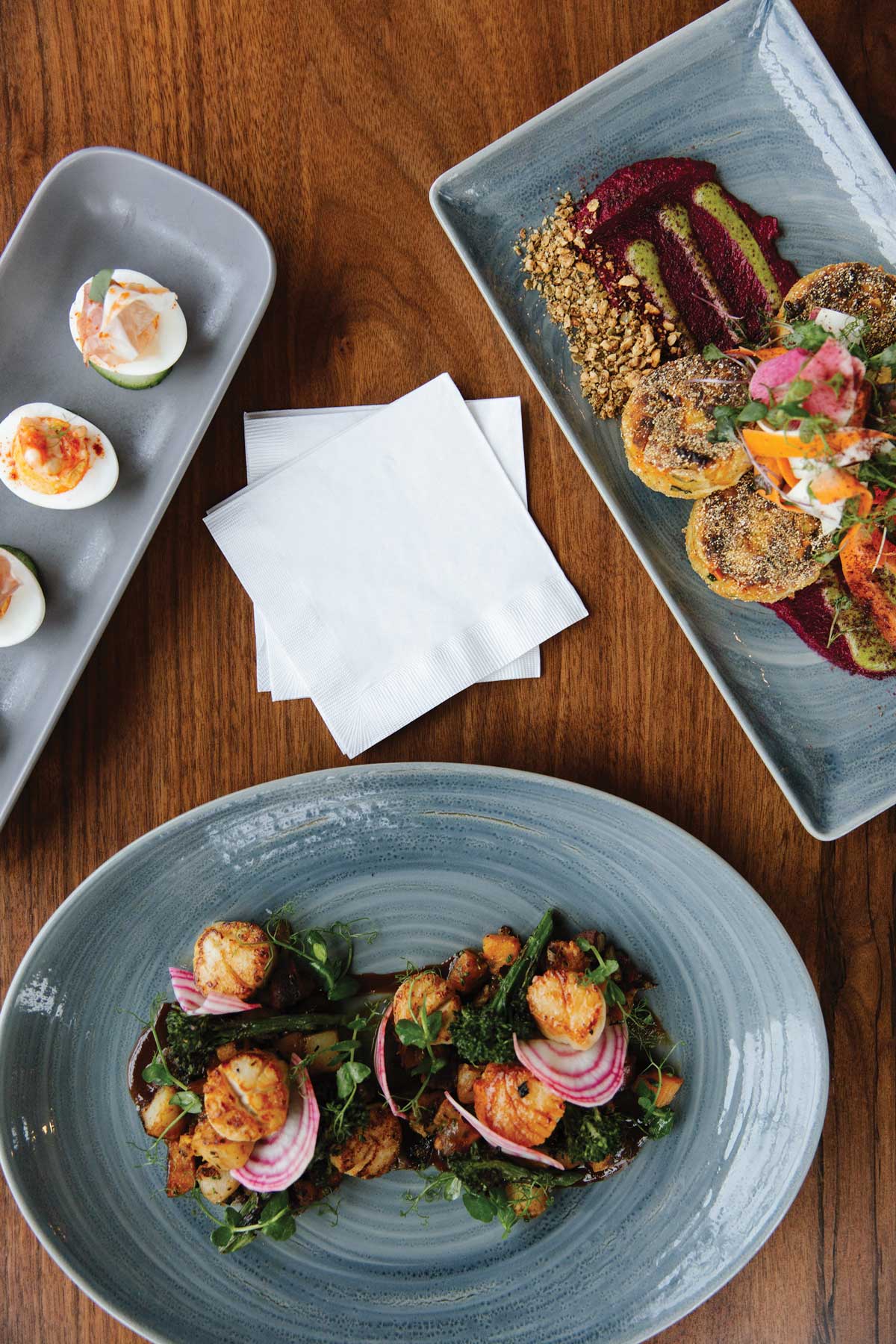 Deviled eggs, veggie cakes with beet hummus, and scallops from Waterville's Front & Main