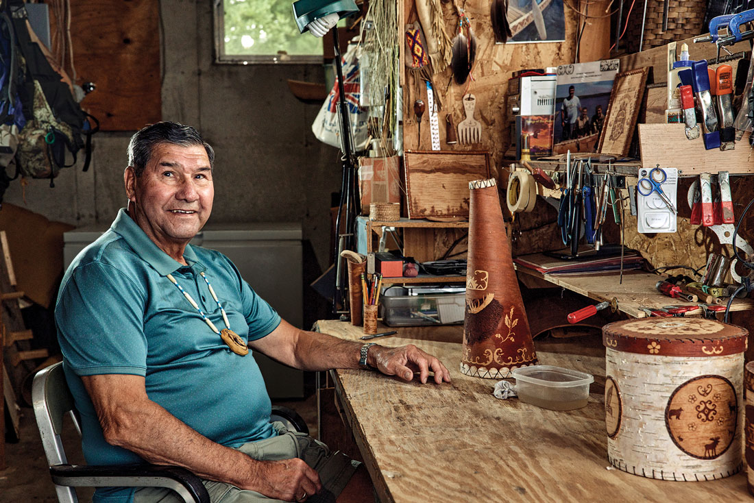 Butch Phillips in his basement workshop in Milford