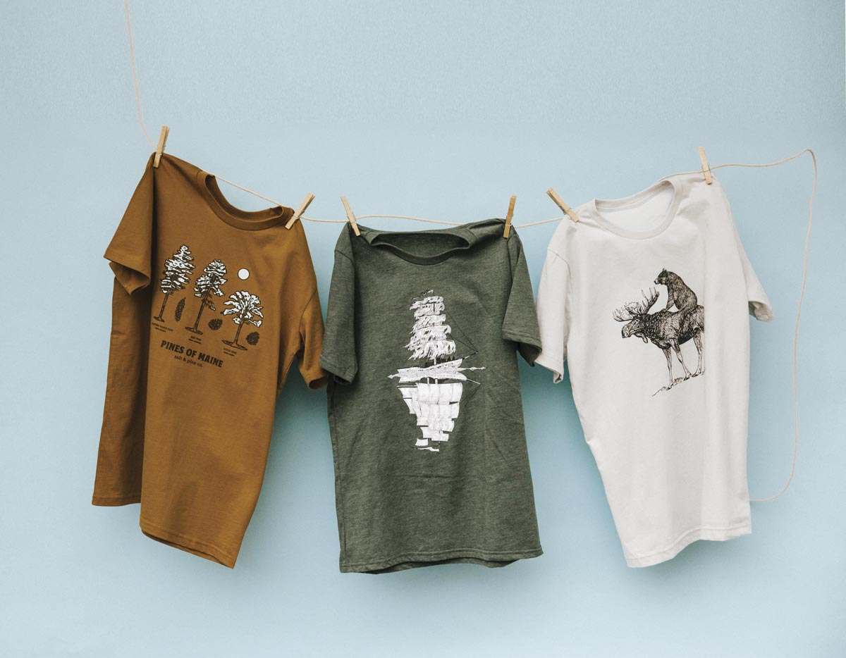 three Maine-themed graphic t-shirts