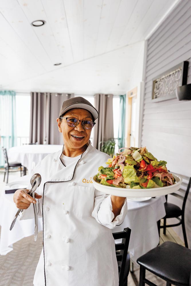 Lulu Ranta with a salad at The Quarry in Monson, Maine