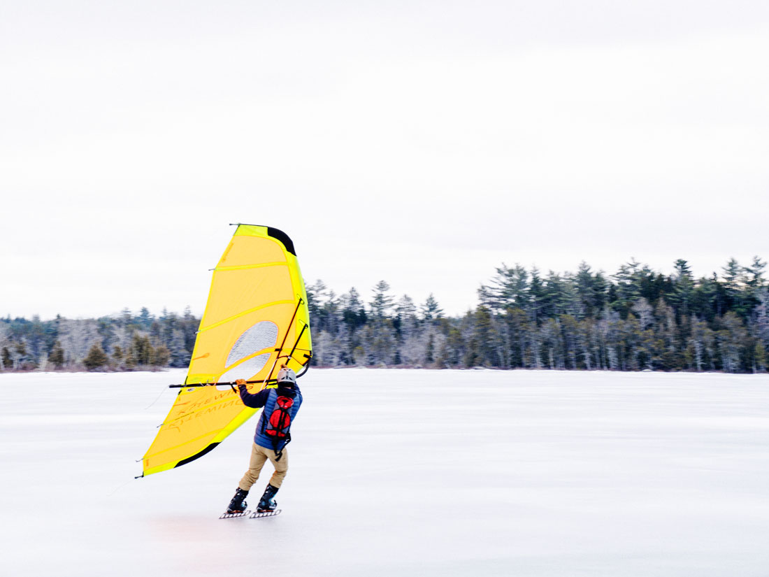 Tim Hynd and his kitewing skating on Compass Pond, near Baxter State Park
