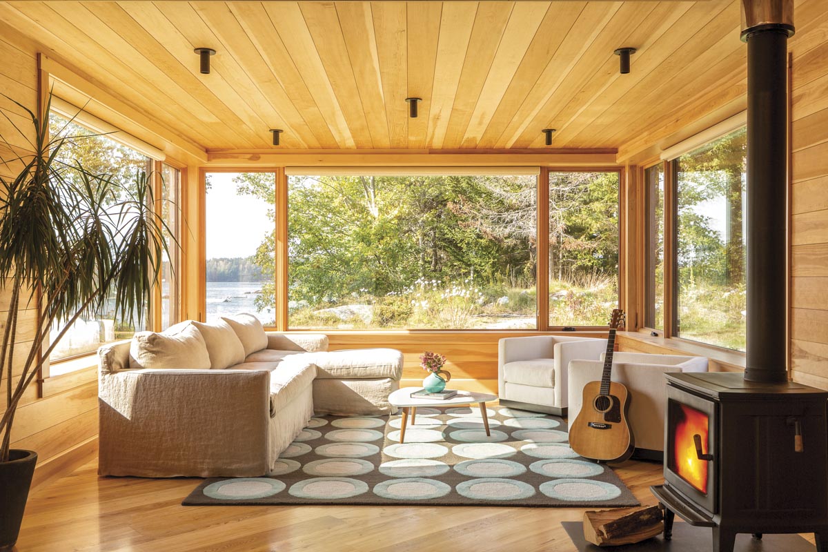 locally sourced pine paneling in a living area with a giant picture window